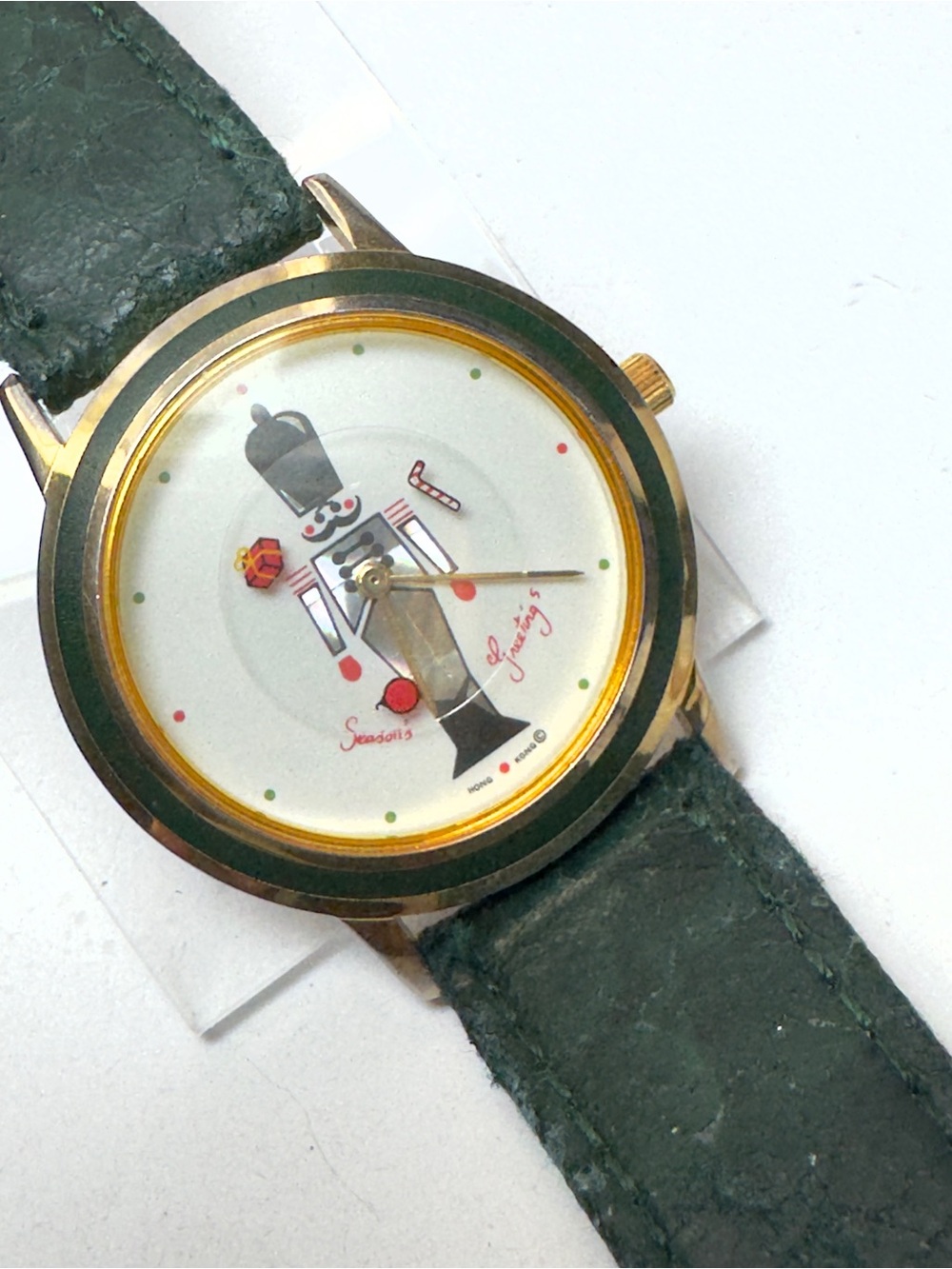 Gold-Tone Nutcracker Dial Watch with Dark Green Leather Strap